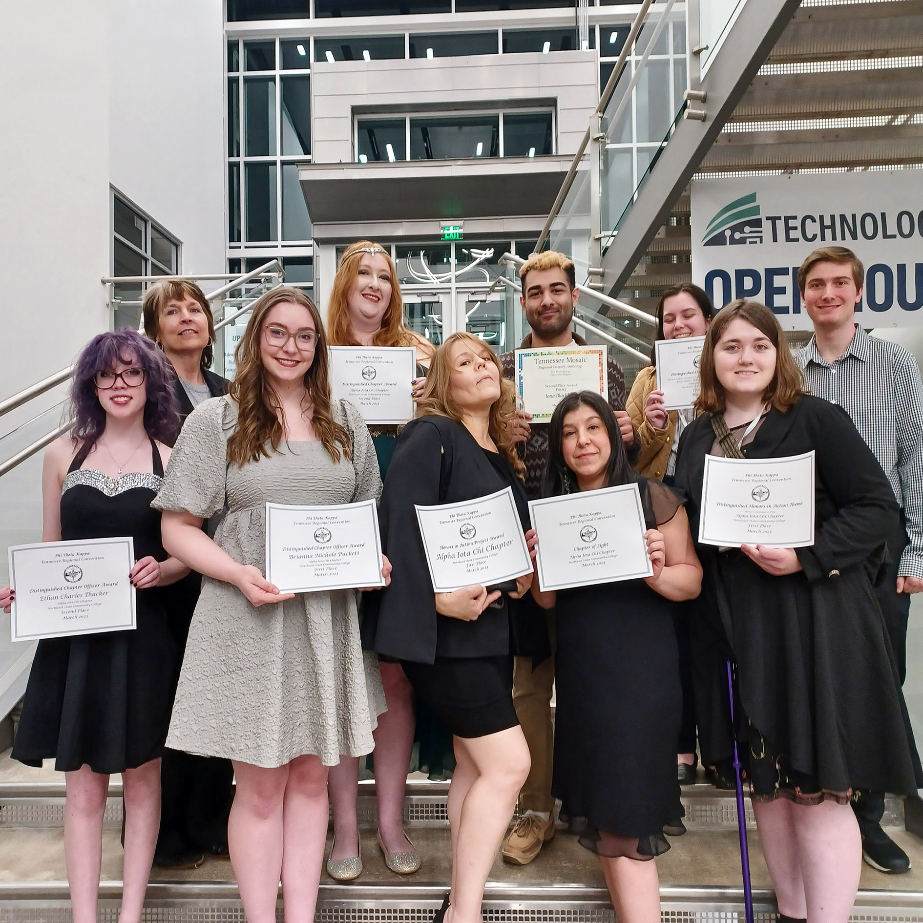 Alpha Iota Chi chapter officers and members celebrate their awards.