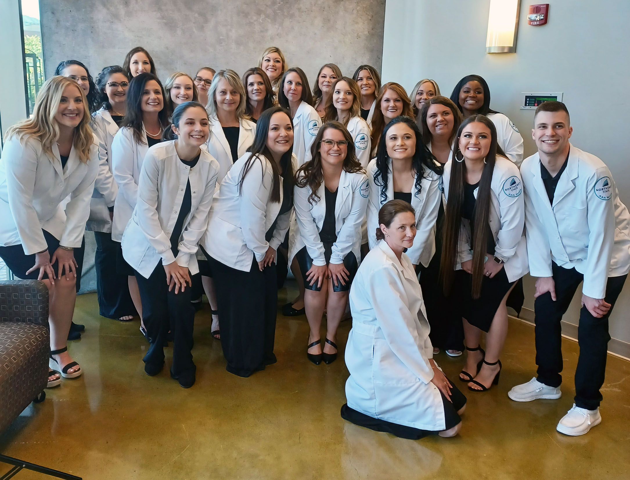 The spring 2023 class of nursing graduates receive their pins at the May 5 pinning ceremony in KCHE.