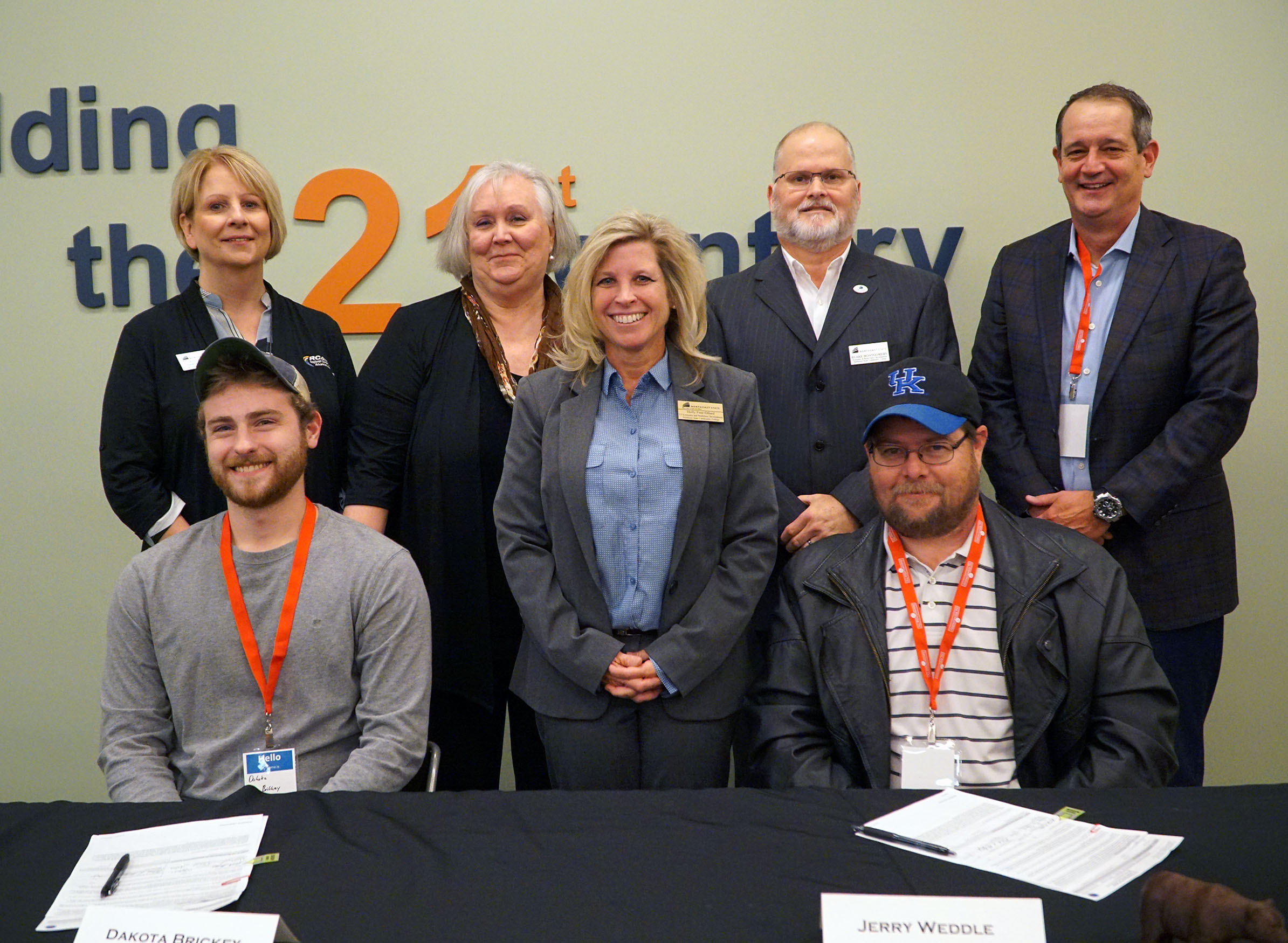 New apprentices from Primester sign their contracts. (Seated from left, Dakota Brickey and Jerry Weddle). Northeast State staff (from left) Jo Starling, Cindy Necessary, Dr. Holly Free-Ollard, Blake Montgomery, and Dr. Jeff McCord.