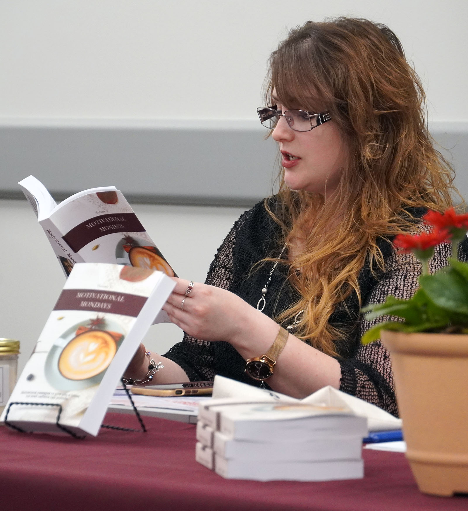 April Allen reads from her book Motivational Mondays during a book signing held at Basler Library.