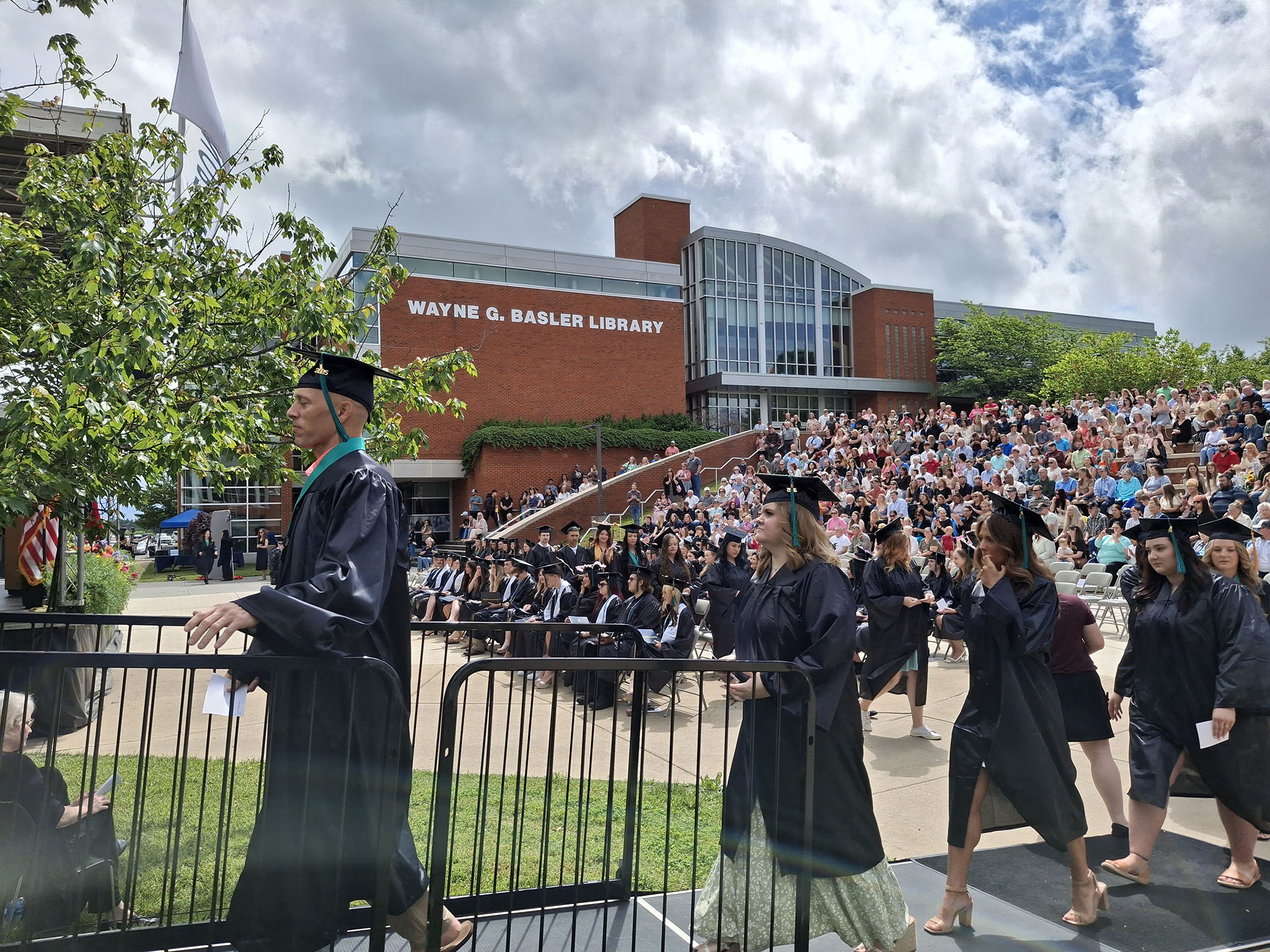 New graduates from the divisions of Health Professions and Science flipped their tassels for spring graduation.
