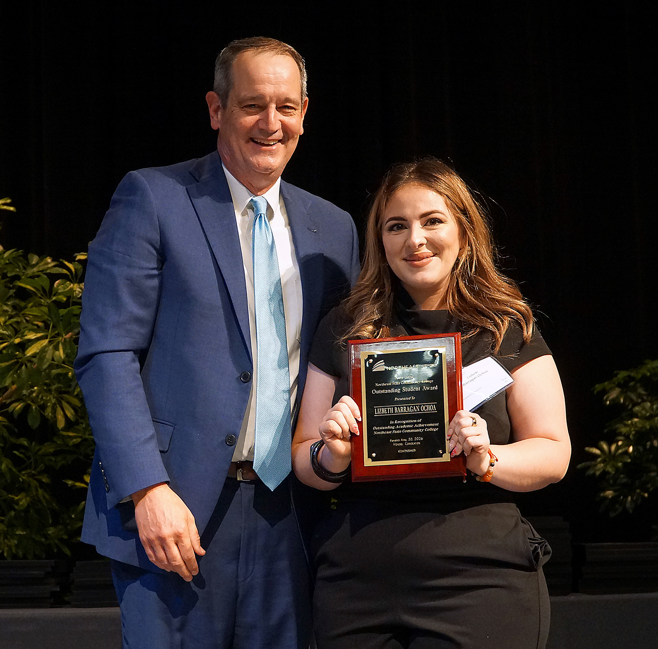Northeast State President Dr. Jeff McCord presents Lizbeth Barragan-Ochoa with the Outstanding Student of the Year Award.